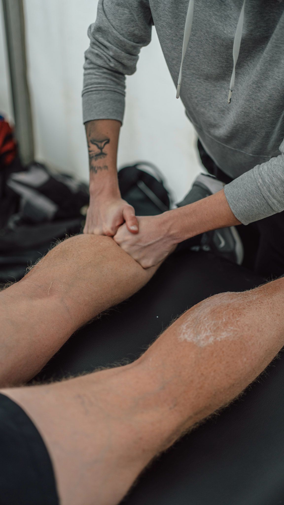 Sports therapist treating a client